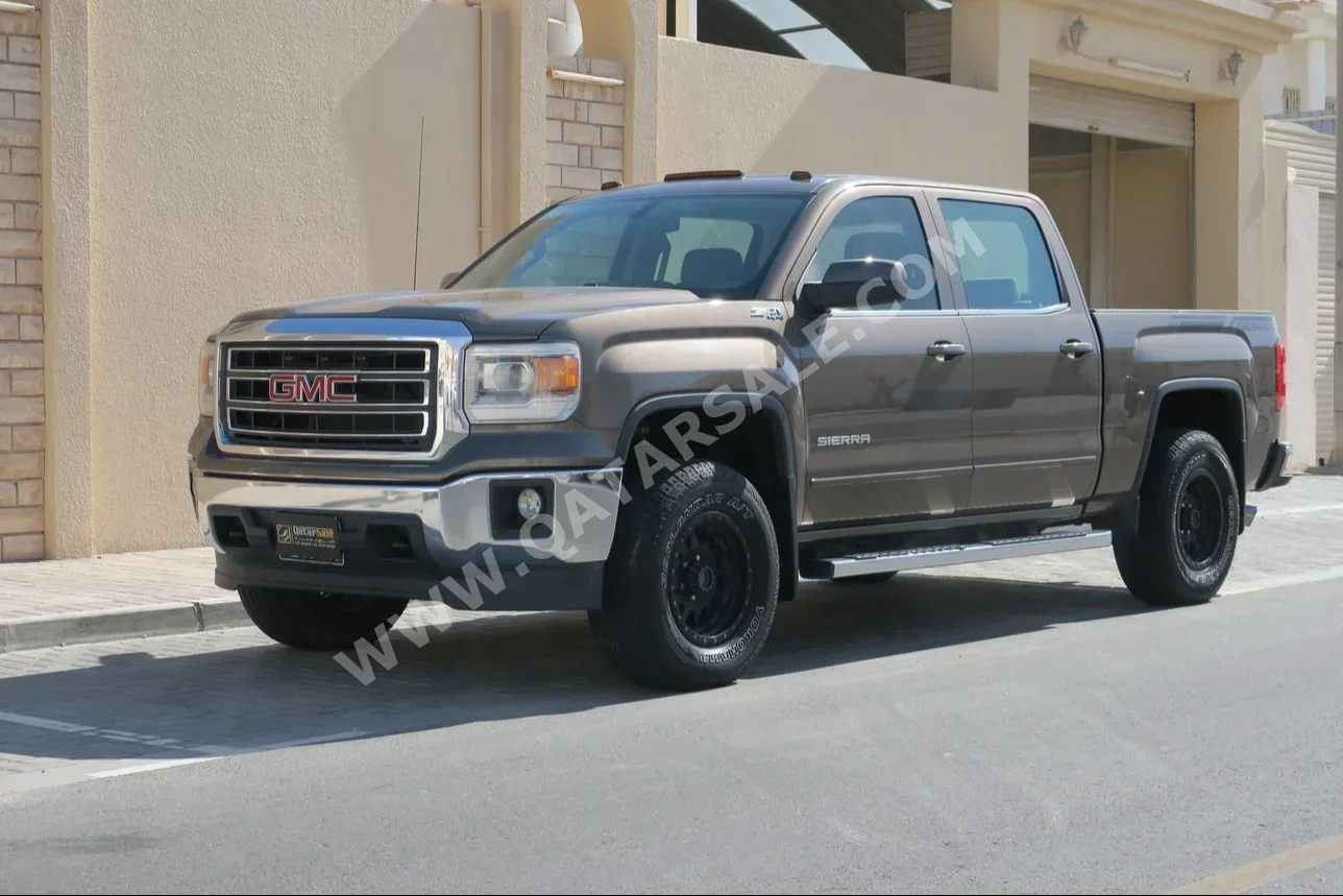 GMC  Sierra  1500  2014  Automatic  229,000 Km  8 Cylinder  Four Wheel Drive (4WD)  Pick Up  Brown
