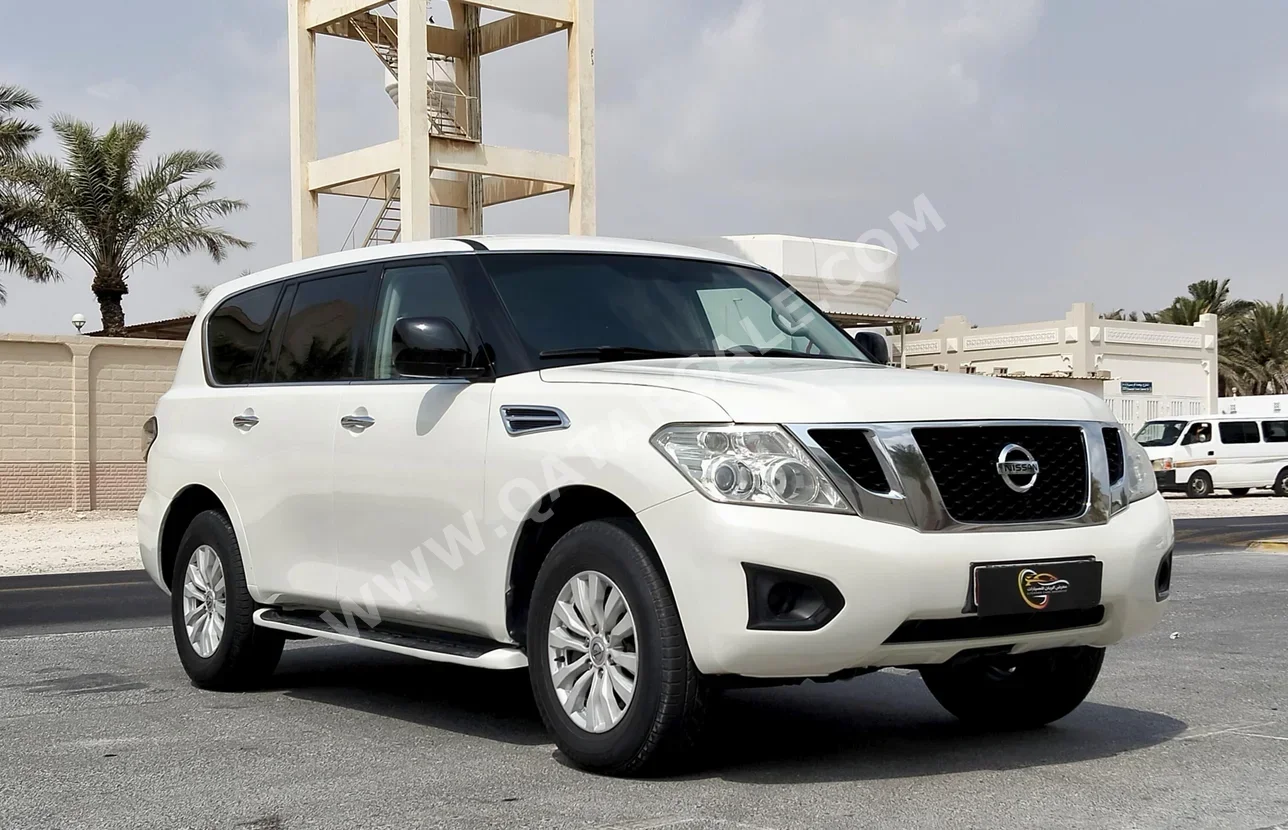 Nissan  Patrol  XE  2014  Automatic  260,000 Km  6 Cylinder  Four Wheel Drive (4WD)  SUV  White