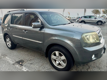 هوندا  بايلوت  2011  اوتوماتيك  151,500 كم  6 سلندر  اس يو في  رمادي