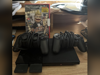 Video Games Consoles - Sony  - PlayStation 2 Slim  -Included Controllers: 2