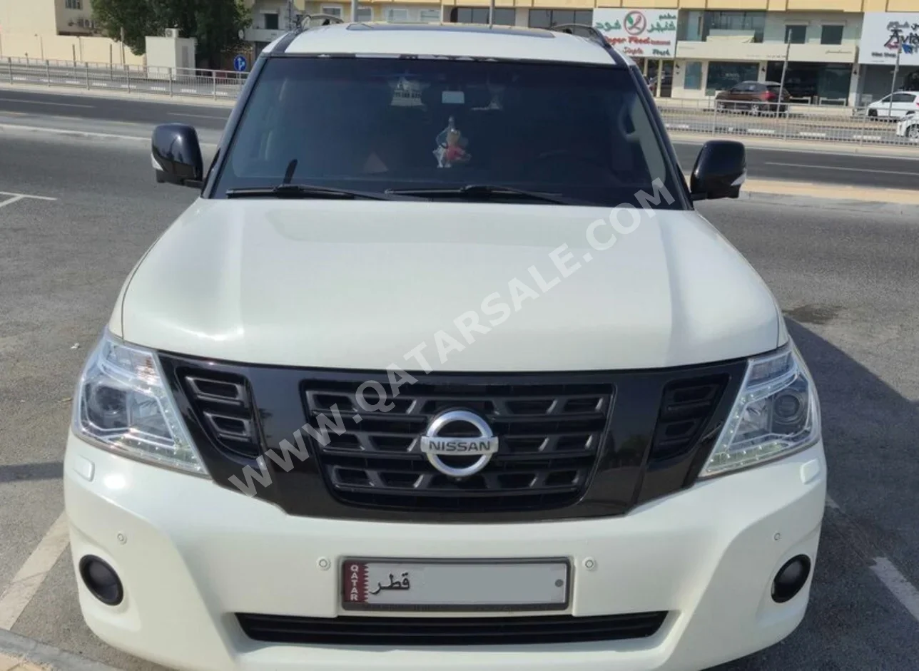 Nissan  Patrol  Platinum  2016  Automatic  165,000 Km  8 Cylinder  Four Wheel Drive (4WD)  SUV  White