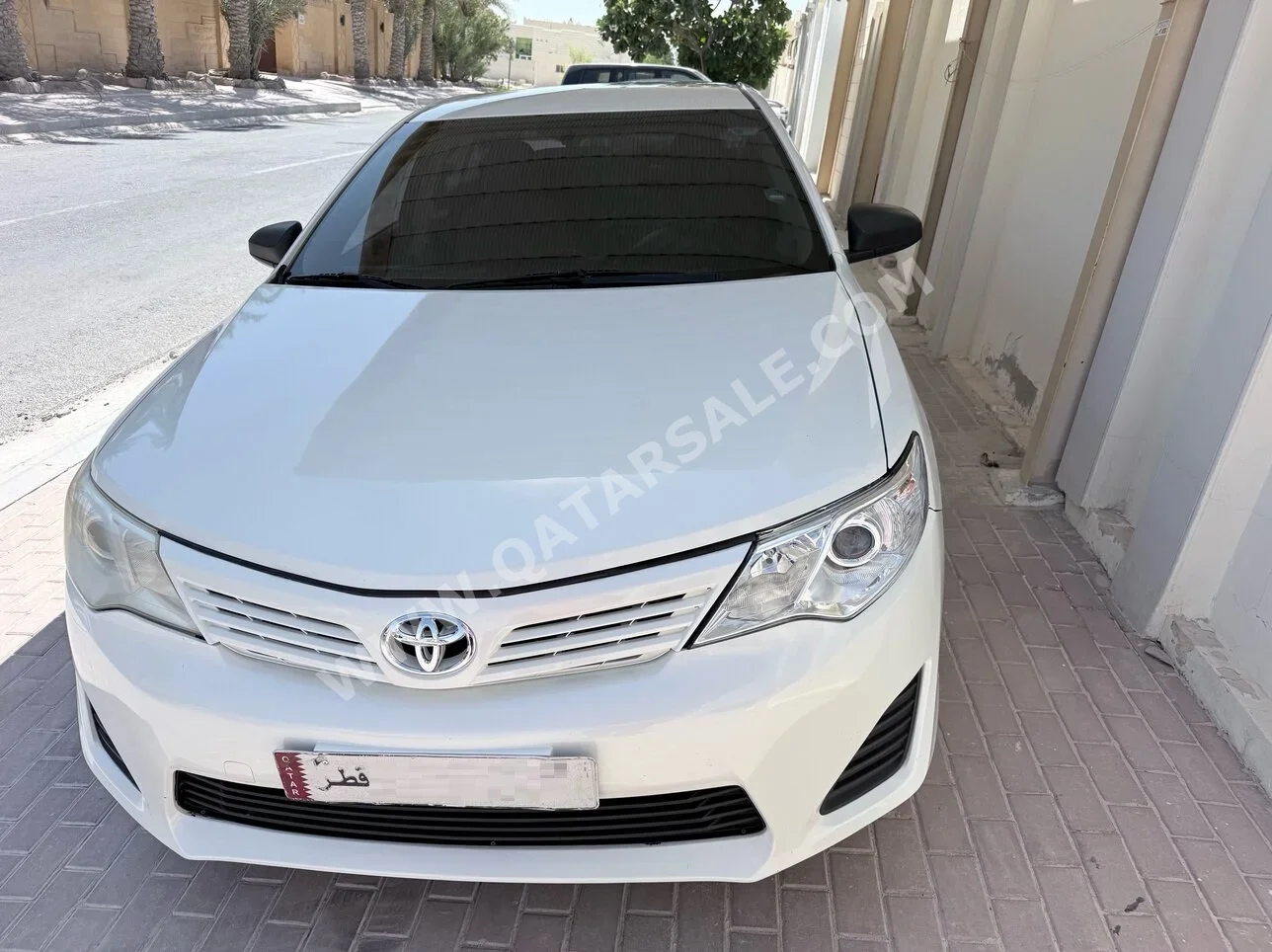 تويوتا  كامري  جي ال  2014  اوتوماتيك  282,000 كم  4 سلندر  سحب امامي  سيدان  أبيض لؤلؤي