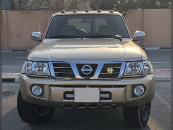 Nissan  Patrol  Super Safari  2002  Automatic  220,000 Km  6 Cylinder  Four Wheel Drive (4WD)  SUV  Gold