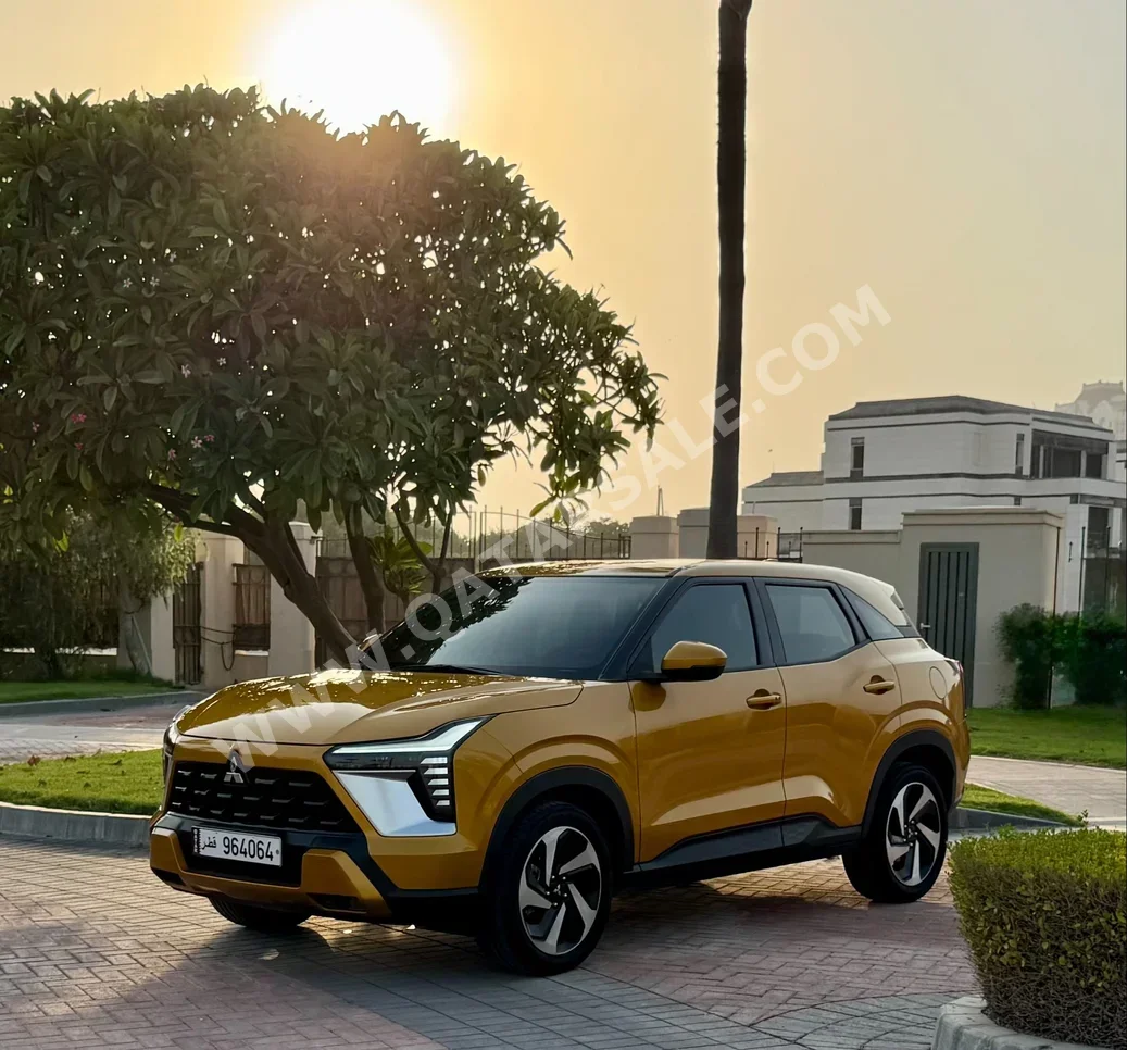 Mitsubishi  XForce  2025  Automatic  10,000 Km  4 Cylinder  Four Wheel Drive (4WD)  SUV  Gold  With Warranty