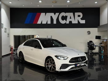 Mercedes-Benz  C-Class  300 AMG  2023  Automatic  80,000 Km  4 Cylinder  Rear Wheel Drive (RWD)  Sedan  White  With Warranty