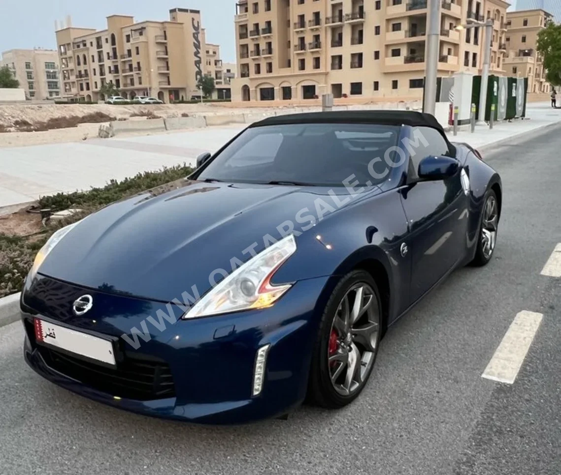 Nissan  Z  370  2016  Automatic  91,316 Km  6 Cylinder  Rear Wheel Drive (RWD)  Convertible  Blue