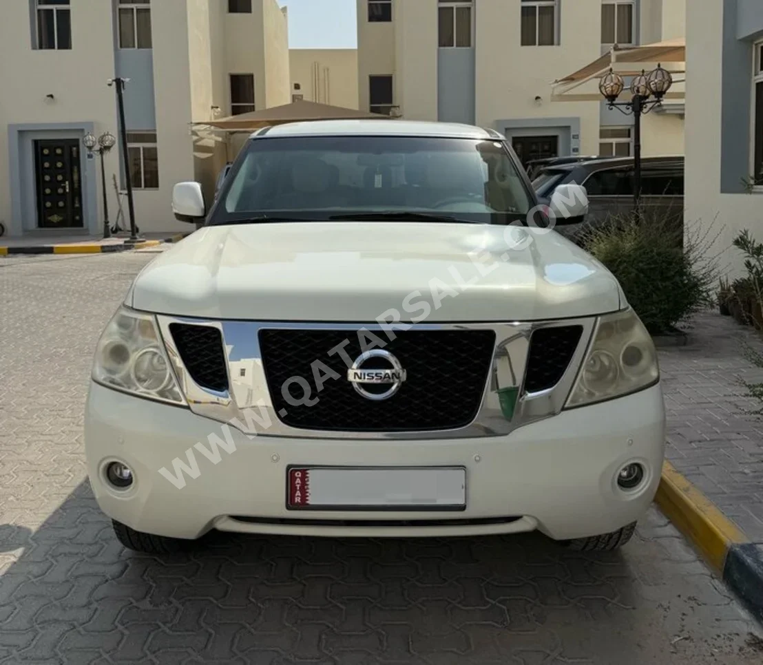 Nissan  Patrol  LE  2010  Automatic  120,000 Km  8 Cylinder  Four Wheel Drive (4WD)  SUV  Cream