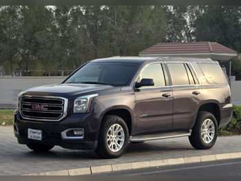 GMC  Yukon  2015  Automatic  400,000 Km  8 Cylinder  Four Wheel Drive (4WD)  SUV  Dark Brown