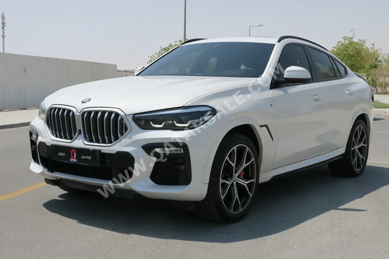 بي ام دبليو  الفئة - اكس  اكس 6  2021  اوتوماتيك  80,000 كم  6 سلندر  دفع رباعي  اس يو في  أبيض  تحت الضمان