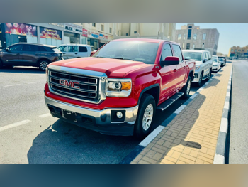GMC  Sierra  SLE  2015  Automatic  118,000 Km  8 Cylinder  Four Wheel Drive (4WD)  Pick Up  Red