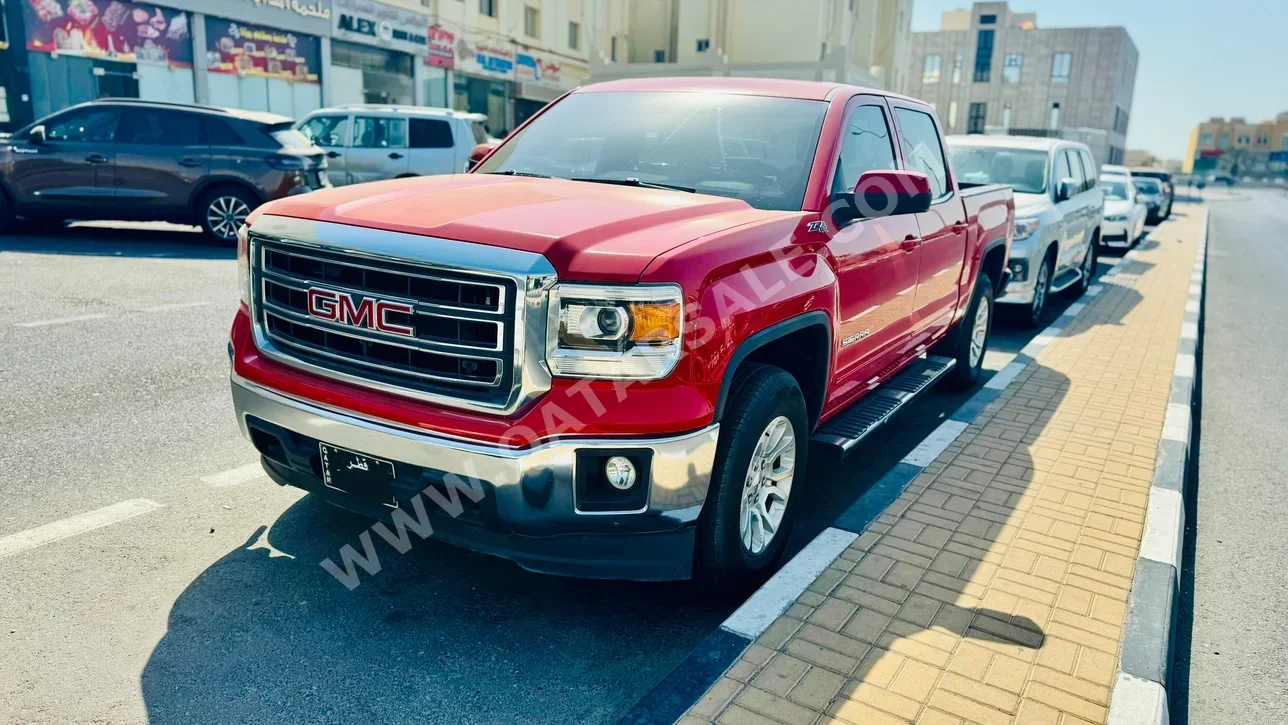 GMC  Sierra  SLE  2015  Automatic  118,000 Km  8 Cylinder  Four Wheel Drive (4WD)  Pick Up  Red
