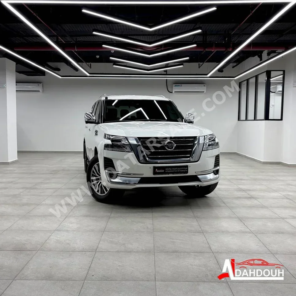 Nissan  Patrol  Platinum  2021  Automatic  154,000 Km  6 Cylinder  Four Wheel Drive (4WD)  SUV  White