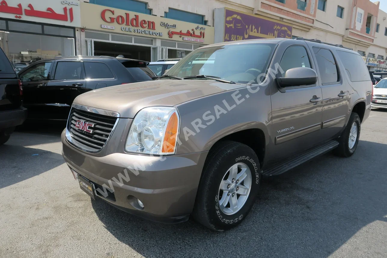 GMC  Yukon  XL  2011  Automatic  106,000 Km  8 Cylinder  Four Wheel Drive (4WD)  SUV  Brown