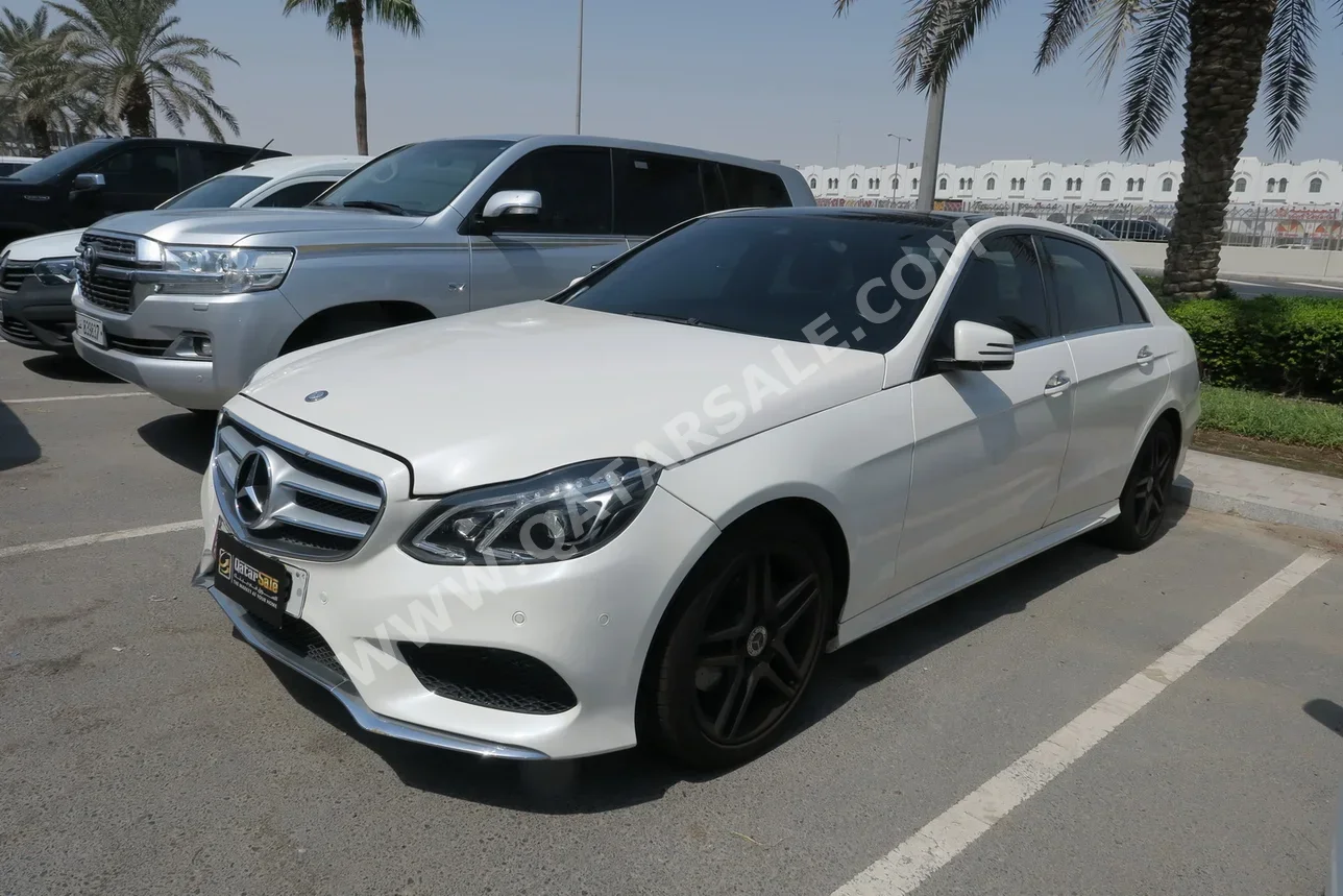 Mercedes-Benz  E-Class  300  2014  Automatic  160,000 Km  6 Cylinder  Rear Wheel Drive (RWD)  Sedan  White