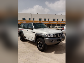 Nissan  Patrol  Super Safari  2022  Automatic  12,000 Km  6 Cylinder  Four Wheel Drive (4WD)  SUV  White