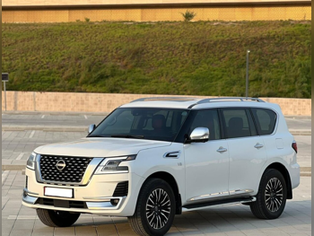 Nissan  Patrol  Platinum  2022  Automatic  133,000 Km  8 Cylinder  Four Wheel Drive (4WD)  SUV  White