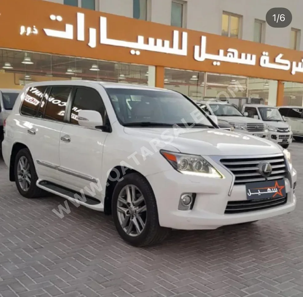 Lexus  LX  570  2014  Automatic  209,000 Km  8 Cylinder  Four Wheel Drive (4WD)  SUV  White