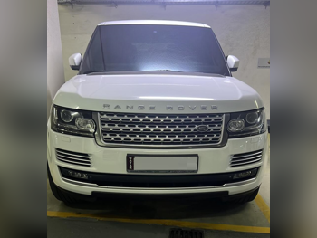 Land Rover  Range Rover  Vogue SE Super charged  2015  Automatic  112,000 Km  8 Cylinder  Four Wheel Drive (4WD)  SUV  White