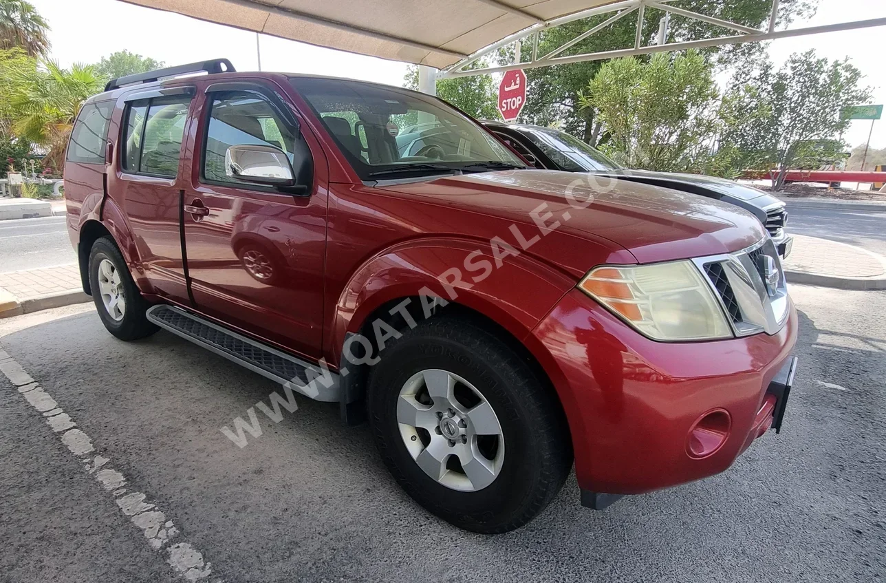 Nissan  Pathfinder  SE  2009  Automatic  317,000 Km  6 Cylinder  Four Wheel Drive (4WD)  SUV  Red