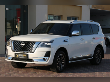 Nissan  Patrol  Platinum  2022  Automatic  88,000 Km  8 Cylinder  Four Wheel Drive (4WD)  SUV  White  With Warranty