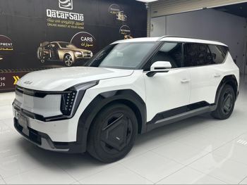 Kia  EV  9  2024  Automatic  13,800 Km  0 Cylinder  All Wheel Drive (AWD)  SUV  White  With Warranty