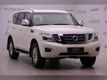 Nissan  Patrol  SE  2015  Automatic  220,000 Km  8 Cylinder  Four Wheel Drive (4WD)  SUV  Pearl