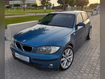 بي ام دبليو الفئة - الاولى 118i 2007 اوتوماتيك 165,000 كم 4 سلندر هاتشباك ازرق
