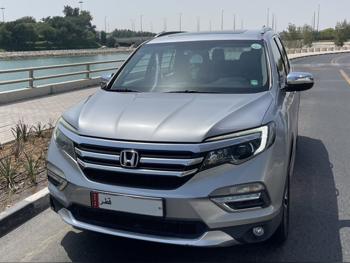 Honda  Pilot  Touring  2016  Automatic  154,000 Km  6 Cylinder  All Wheel Drive (AWD)  SUV  Silver
