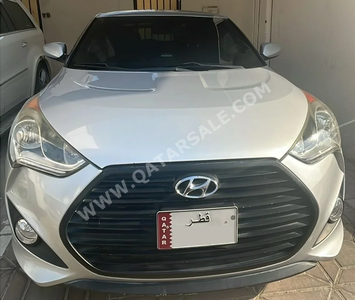 Hyundai  Veloster  2016  Automatic  65,500 Km  4 Cylinder  Front Wheel Drive (FWD)  Hatchback  Silver