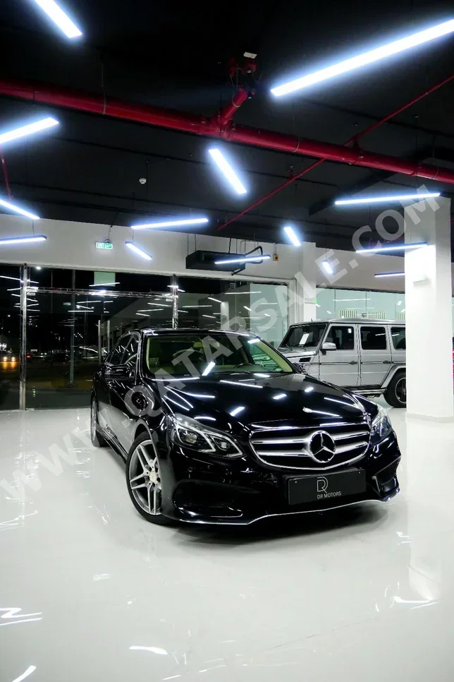 Mercedes-Benz  E-Class  300  2014  Automatic  105,000 Km  6 Cylinder  Rear Wheel Drive (RWD)  Sedan  Black