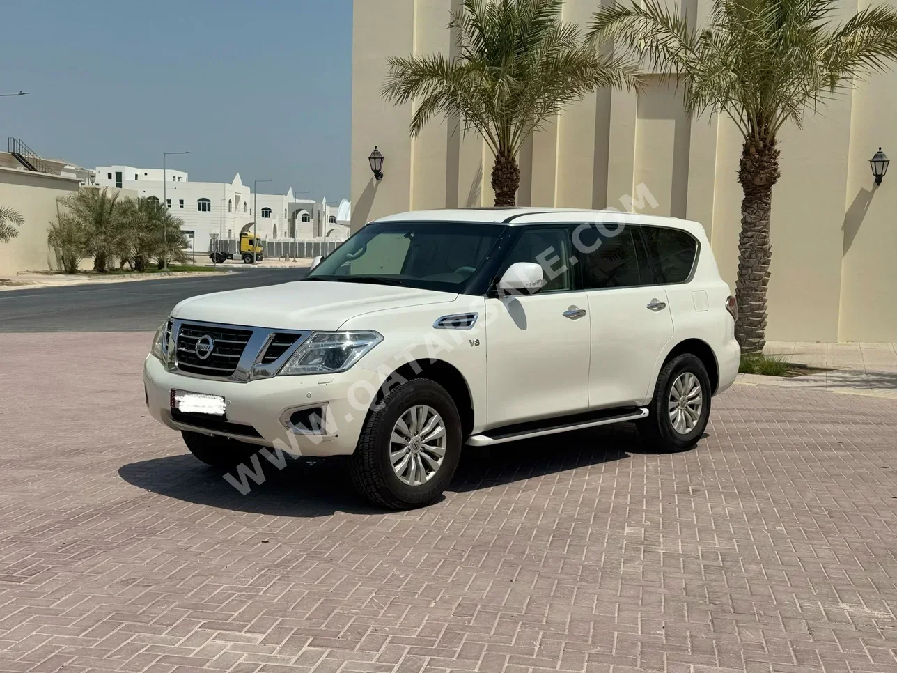Nissan  Patrol  SE  2015  Automatic  280,000 Km  8 Cylinder  Four Wheel Drive (4WD)  SUV  White