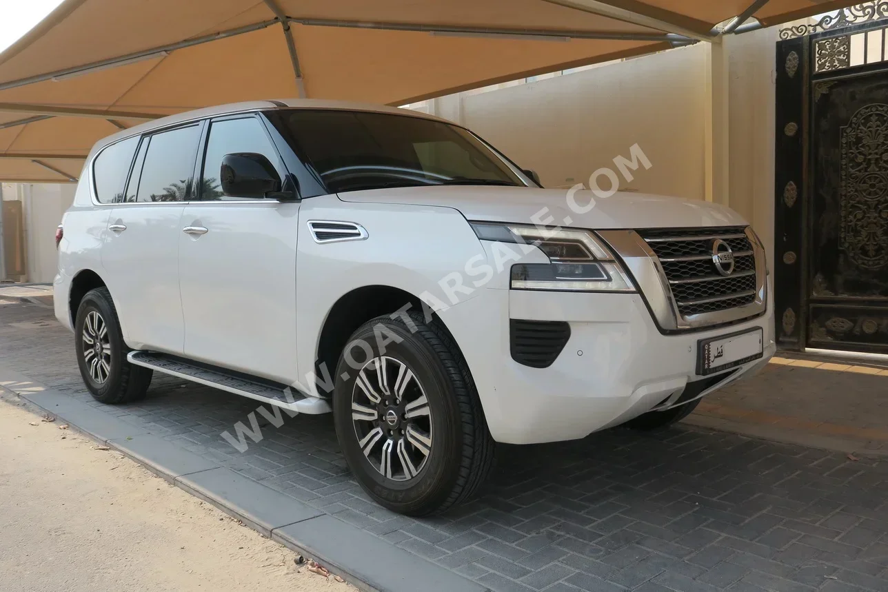 Nissan  Patrol  XE  2020  Automatic  165,000 Km  6 Cylinder  Four Wheel Drive (4WD)  SUV  White