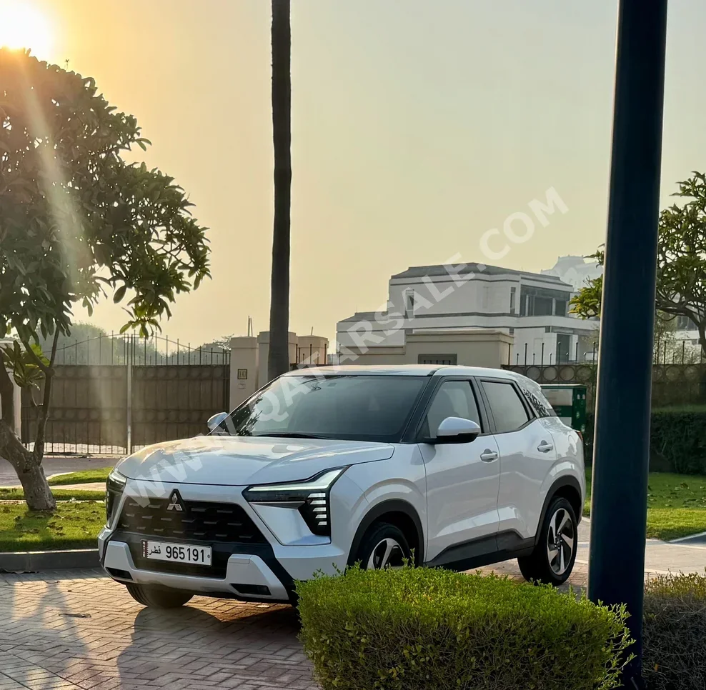 Mitsubishi  XForce  2025  Automatic  11,000 Km  4 Cylinder  Front Wheel Drive (FWD)  SUV  White  With Warranty