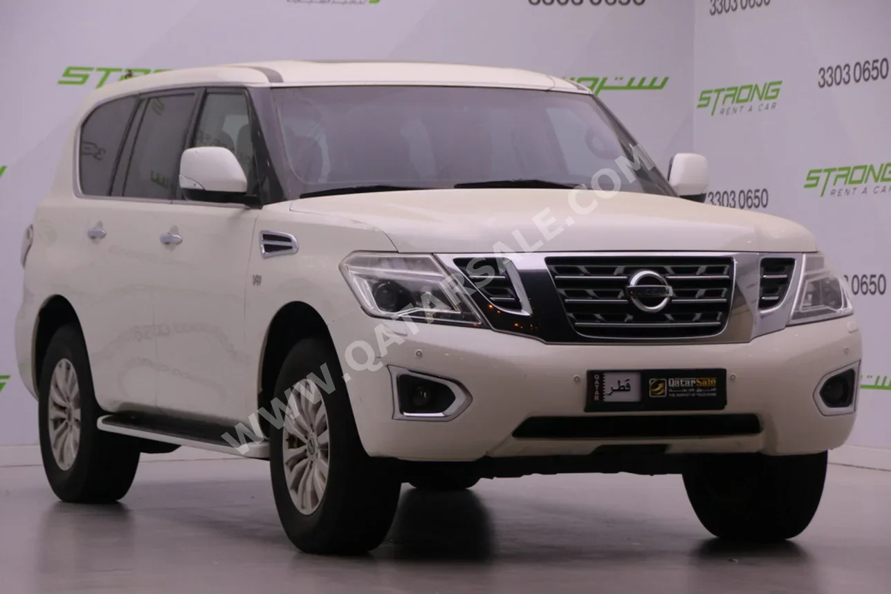 Nissan  Patrol  SE  2014  Automatic  162,000 Km  8 Cylinder  Four Wheel Drive (4WD)  SUV  White