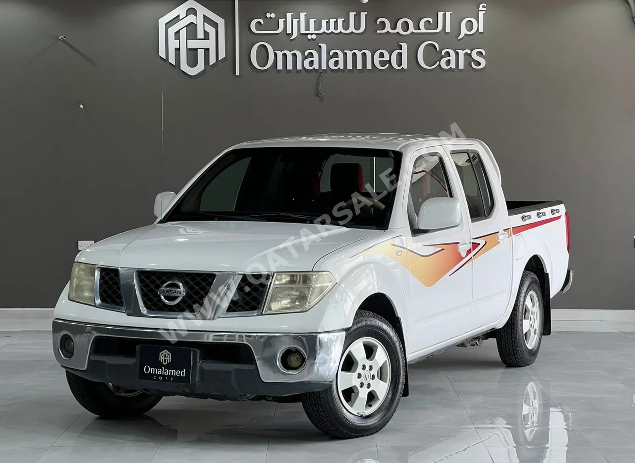 نيسان  نافارا  أس اي  2011  عادي  245,000 كم  4 سلندر  دفع خلفي  بيكب  أبيض