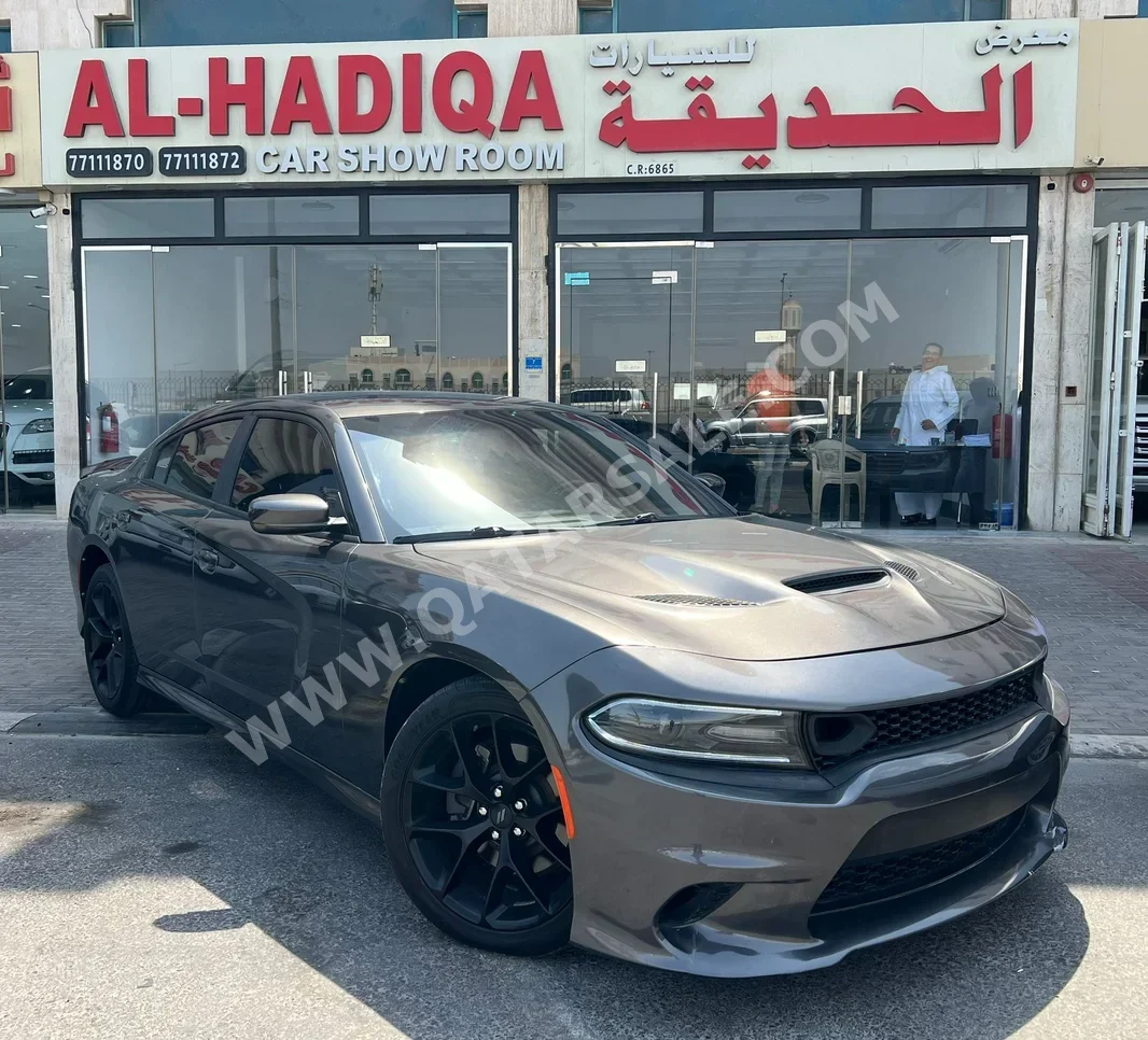 دودج  تشارجر  جي تي  2019  اوتوماتيك  43,000 كم  6 سلندر  دفع خلفي  سيدان  رمادي