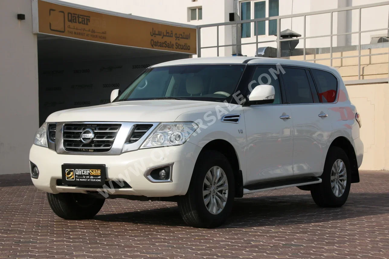 Nissan  Patrol  SE  2014  Automatic  280,000 Km  8 Cylinder  Four Wheel Drive (4WD)  SUV  White