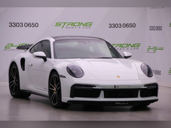 Porsche  911  Turbo S  2021  Automatic  34,000 Km  6 Cylinder  Rear Wheel Drive (RWD)  Coupe / Sport  White  With Warranty