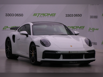 Porsche  911  Turbo S  2021  Automatic  34,000 Km  6 Cylinder  Rear Wheel Drive (RWD)  Coupe / Sport  White  With Warranty