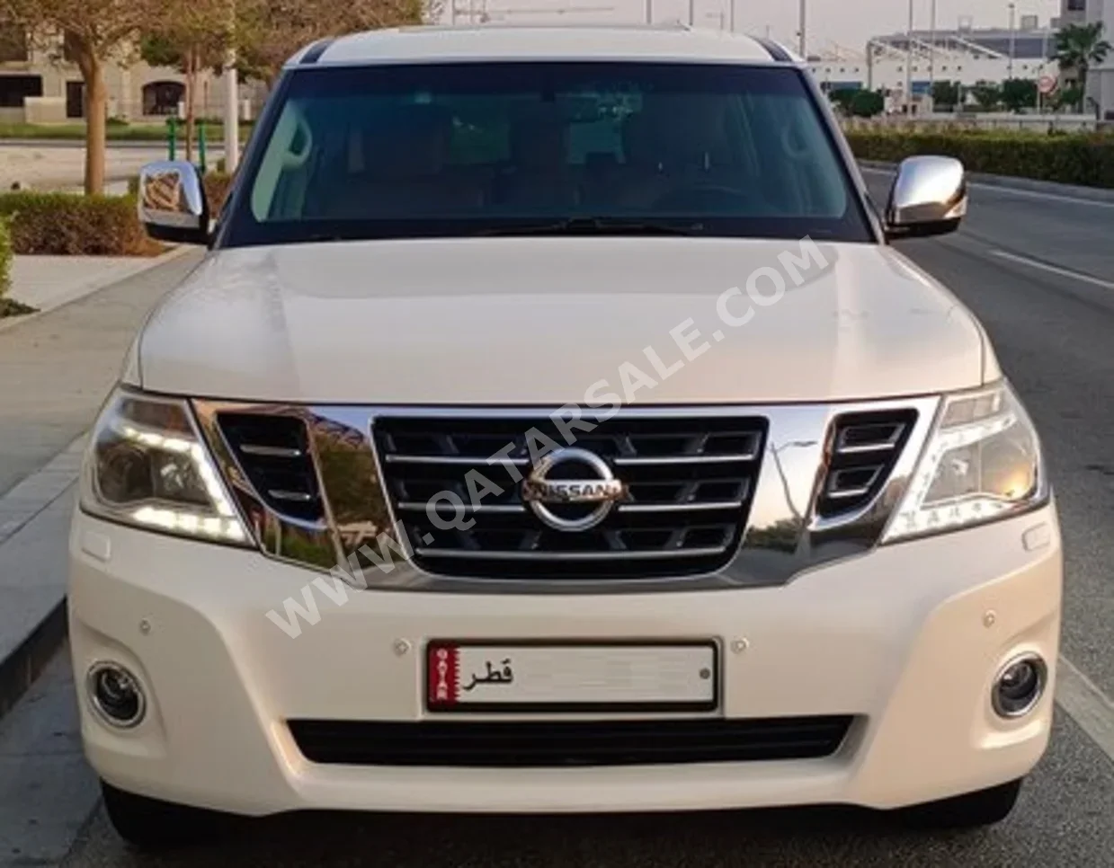 Nissan  Patrol  Titanium  2017  Automatic  124,900 Km  8 Cylinder  Four Wheel Drive (4WD)  SUV  White