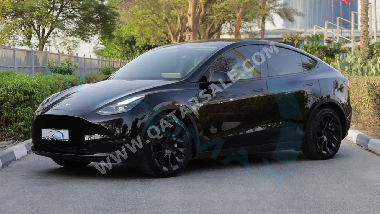 Tesla  Model Y  Long Range  2024  Automatic  34,000 Km  0 Cylinder  All Wheel Drive (AWD)  SUV  Black  With Warranty