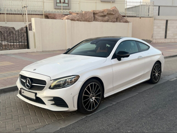 Mercedes-Benz  C-Class  300 AMG  2019  Automatic  64,000 Km  4 Cylinder  Rear Wheel Drive (RWD)  Coupe / Sport  White