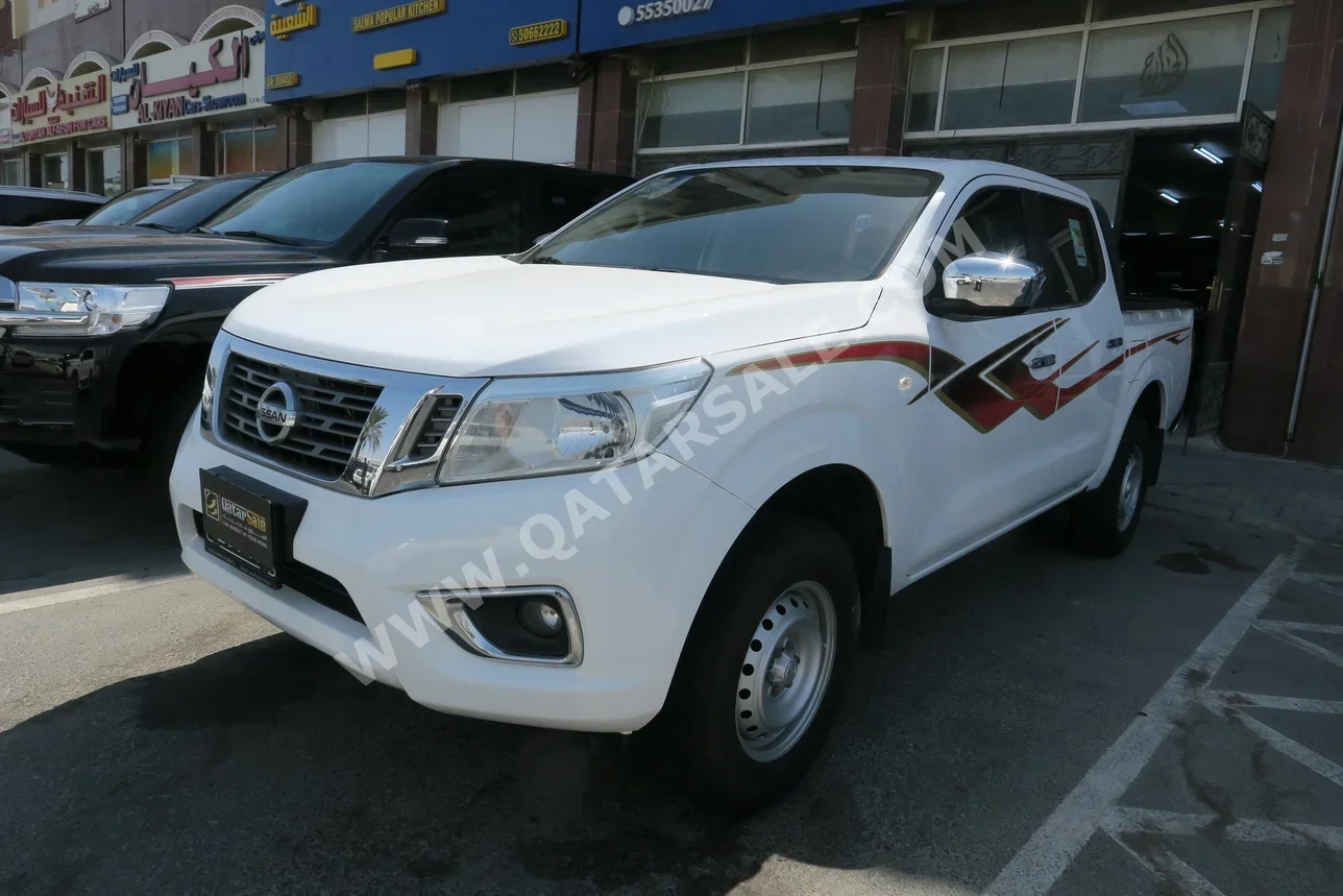 Nissan  Navara  SE  2020  Automatic  38,000 Km  4 Cylinder  Rear Wheel Drive (RWD)  Pick Up  White