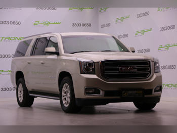GMC  Yukon  2016  Automatic  130,000 Km  8 Cylinder  Four Wheel Drive (4WD)  SUV  Gold