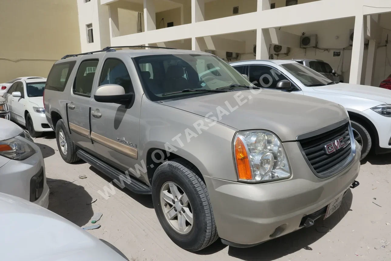 GMC  Yukon  XL  2009  Automatic  147,000 Km  8 Cylinder  Four Wheel Drive (4WD)  SUV  Beige