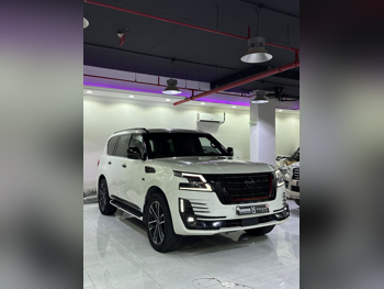 Nissan  Patrol  Platinum  2012  Automatic  90,000 Km  8 Cylinder  Four Wheel Drive (4WD)  SUV  White