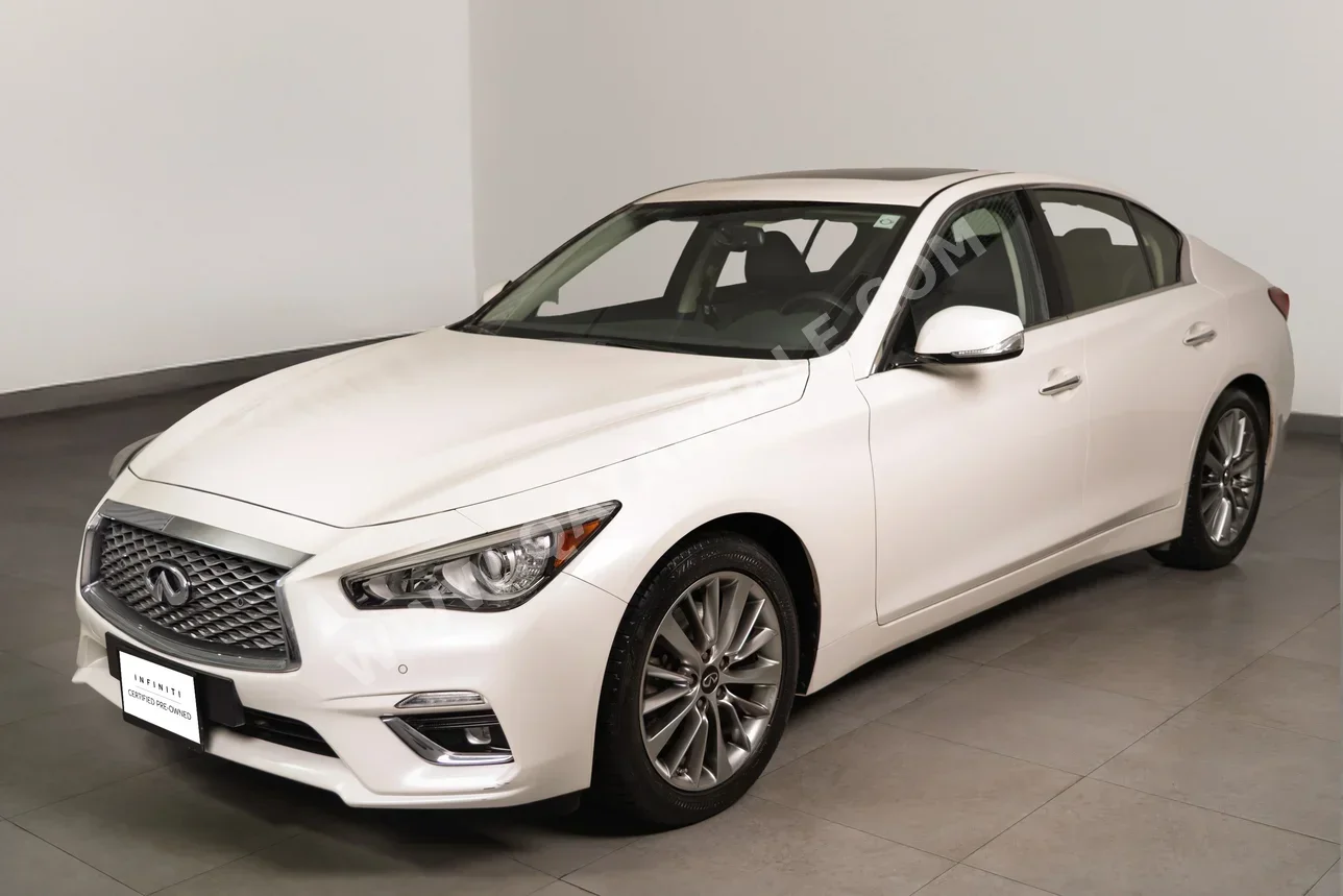 Infiniti  Q  50  2024  Automatic  14,521 Km  4 Cylinder  Rear Wheel Drive (RWD)  Sedan  White  With Warranty