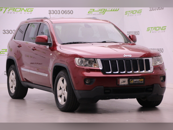 Jeep  Grand Cherokee  Laredo  2013  Automatic  108,000 Km  6 Cylinder  Four Wheel Drive (4WD)  SUV  Maroon