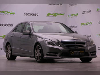 Mercedes-Benz  E-Class  300 AMG  2012  Automatic  157,000 Km  6 Cylinder  Rear Wheel Drive (RWD)  Sedan  Gray