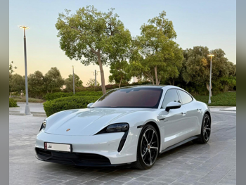 Porsche  Taycan  2021  Automatic  97,000 Km  0 Cylinder  All Wheel Drive (AWD)  Sedan  White  With Warranty